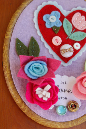 "let love grow" original embroidered wall art with handmade felt flowers and heart