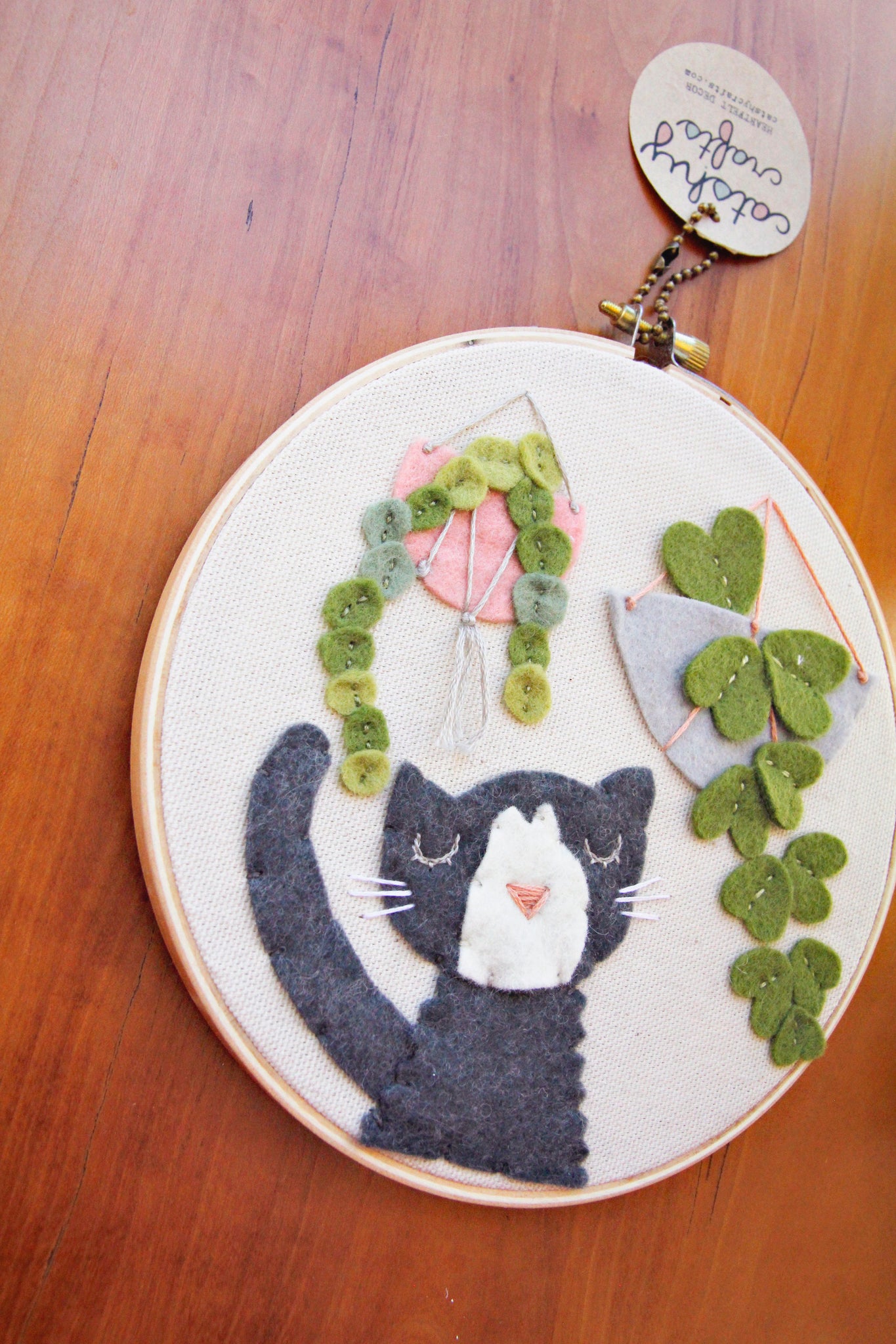 wool felt cat wall hanging in a 3 inch embroidery hoop 